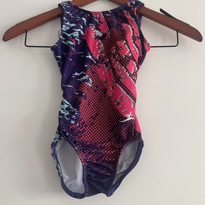 Leotardo de gimnasia para práctica CH 5-6 años uso de movimiento logotipo MAG en la parte posterior Foto 1 de 4