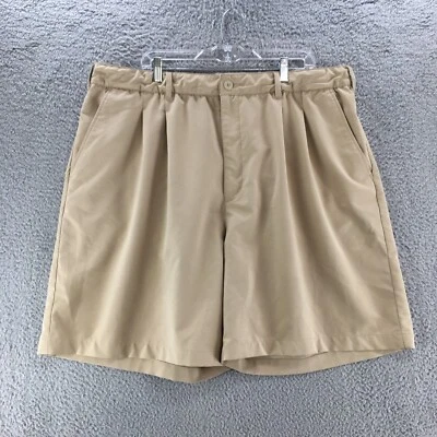 Chino de golf Reebok corto para hombre 50 beige frente plano tiro medio cremallera cintura elástica Foto 1 de 4