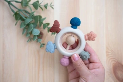 Juguete para dentición de bebé mordedores de silicona anillo de sonajero sensorial sin BPA calmar las encías Foto 1 de 4