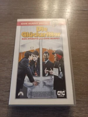 DIE GLÜCKSRITTER VHS KASSETTE MIT DAN AYKROYD + EDDIE MURPHY - Bild 1 von 3