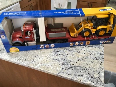 Bruder 1/16 02813 Mack Granite Truck w/ JCB 4CX Loader. - Image 1 of 4