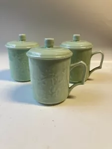Juego de tres tazas de té Celadon con tapas bambú flores de cerezo y loto - Imagen 1 de 9