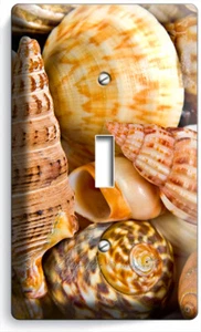 CONCHIGLIE MARE ESTATE OCEANO SPIAGGIA LUCE INTERRUTTORE SINGOLO PIASTRA PARETE ARREDAMENTO BAGNO CAMERA - Foto 1 di 1