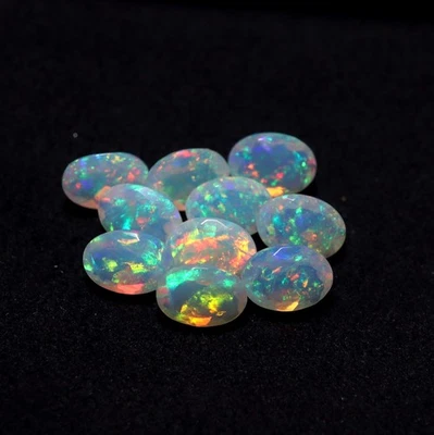 7x5 MM Oval Cut Natural AAAA Flashy Multi Fire Ethiopian Opal 10 Pieces Lot - Image 1 of 4
