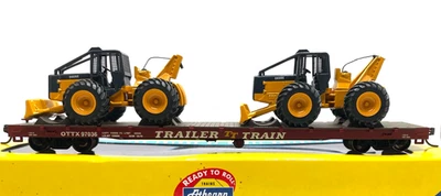 HO ATHEARN 92734 60' FLAT CAR TRAILER TRAIN TTX WITH 2 JOHN DEERE LOG SKIDDER - Image 1 of 2