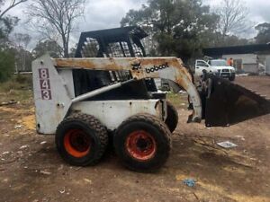 Used Bobcat 843 White/Red, Good Condition 