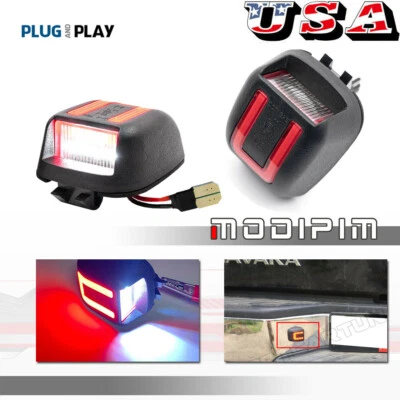 Luz de matrícula LED blanca y roja de 2 piezas para Nissan Titan Xterra Armada 2008-2015 Foto 1 de 4