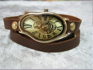 Reloj de fusión Salvador Dalí deformación del tiempo fluido ondulado reloj suave números romanos - Imagen 1 de 12