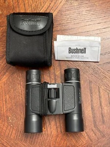 Bushnell 10X25 Compact Binoculars & Belt Pouch 300 feet at 1000 yards - Picture 1 of 6