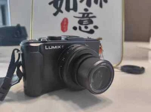 Panasonic LUMIX DMC-LX7 10.1MP 3.8x Optical Zoom CMOS Digital Camera English - Picture 1 of 7