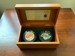Wayne Gretzky - Gordie Howe, Upper Deck, Autographed and Numbered Game Pucks - Picture 1 of 3