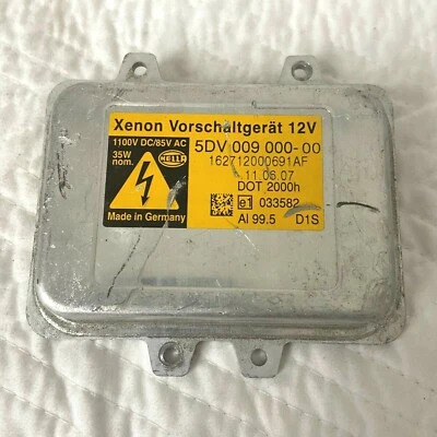 Lastro de farol CADILLAC ESCALADE ESV XENÔNIO HELLA 5DV009000-00 2007 - 2014 FABRICANTE DE EQUIPAMENTO ORIGINAL - Imagem 1 de 4