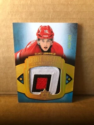 2013-14 Ultimate Collection Debut Threads Patches #UDTEL Elias Lindholm 83/100 - Image 1 of 2