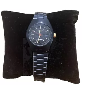 Reloj Citizen vintage mujer. Negro con brazos dorados y rojos. Sostiene bien el tiempo - Imagen 1 de 10