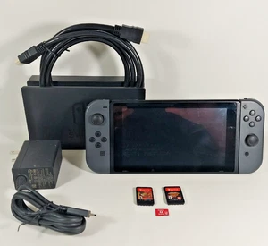 Nintendo Switch Konsole Bundle mit 3 Spielen, 2 Karten und 1 Digital Mario Spiel - Bild 1 von 14