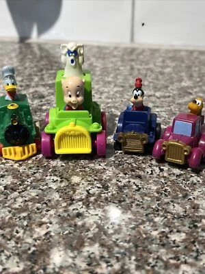 Lote de figuras de vehículo Warner Bros Disney Porky Pig Donald Duck Goofy Pluto Trains Foto 1 de 4