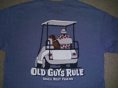 Nueva camiseta marca Old Guys Rule - Camiseta Dogs Best Friend & Guy montando en carrito de golf Foto 1 de 4