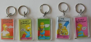 Set 5 Portachiavi THE SIMPSONS Lucite Nuovi - Foto 1 di 12