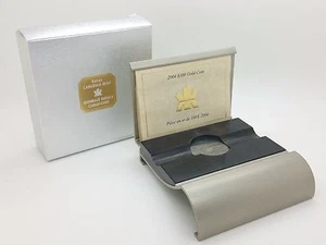 Moneda de 100 dólares a prueba de oro Royal Canadian Mint 2004 metal gris madera caja vacía certificado de autenticidad - Imagen 1 de 9
