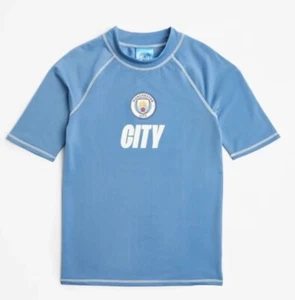 Boys size 10 Blue Manchester City football club rash vest top NEW UPF50 + - Bild 1 von 3