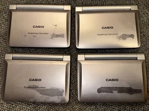 Lot Of 4 Casio FX-9860G Slim Graphing Calculator - Compact Size (Read) Tested - Picture 1 of 3