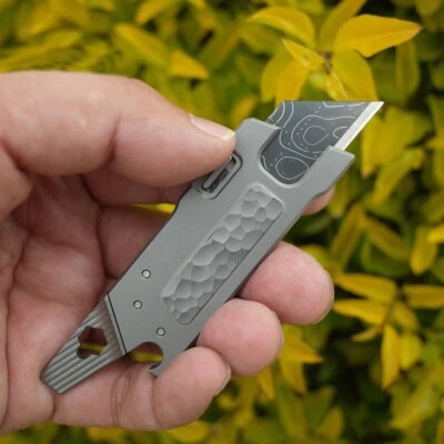 Multiherramienta de titanio para exteriores EDC TC4 cortador de llavero utilitario abridor de cuchillos palanca Foto 1 de 4