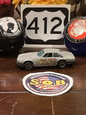 Jaguar XJS 1977 cupé Hot Wheels Blackwalls 1:64 gris usado en muy buen estado Foto 1 de 4