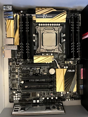 ASUS X79-DELUXE Socket LGA2011 DDR3 ATX Motherboard With I/O Shield & i7-4630K - Image 1 of 3