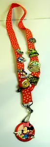 Disney World Theme Parks Minnie Mouse Lanyard and 8 collectible pins - Picture 1 of 3