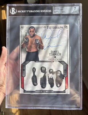 Topps 2015 UFC Knockout Daniel “DC” Cormier Fistograph #4/10 auto BGS UFC HOF’er - Image 1 of 3
