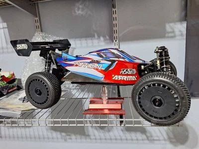 Arrma Typhon 6S "TLR Tuned" 1/8 4WD RTR Brushless Buggy (Red/Blue) ARA8406 - Image 1 of 4