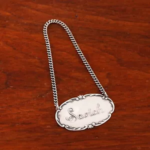 WEBSTER VITTORIANO ARGENTO STERLING BOTTIGLIA ETICHETTA BORDO PERGAMENA " SCOTCH " NO MONO - Foto 1 di 4