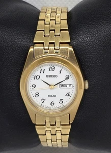 Orologio Donna Seiko Solare Tondo Tono Oro Quadrante Bianco Giorno Data Bracciale 10 - Foto 1 di 7