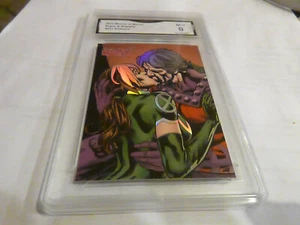 ROGUE & MAGNETO 2013 WOMEN OF MARVEL EMBRACE # E31 GRADED 9 L@@K - Bild 1 von 2