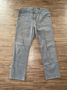 Pantalones de mezclilla AG Adriano Goldschmied The Graduate para hombre 36x32 grises elásticos en la pierna a medida - Imagen 1 de 7