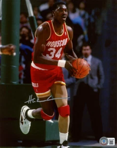 HAKEEM OLAJUWON SIGNED HANDSIGNIERT 8x10 FOTO HOUSTON ROCKETS LEGEND BECKETT BAS - Bild 1 von 2