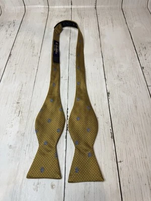Pajarita Brooks Brothers dorada y azul 100 % seda ajustable Foto 1 de 4