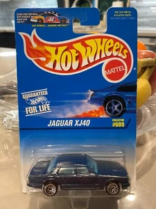 1996 Hot Wheels Blue/White Card #609 JAGUAR XJ40 Dark Blue w/Chrome Lace Spokes - Picture 1 of 1
