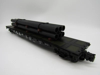 Atlas O Trainman® 52'6" Flat Car with Load - NP 62506 3-Rail - Image 1 of 2