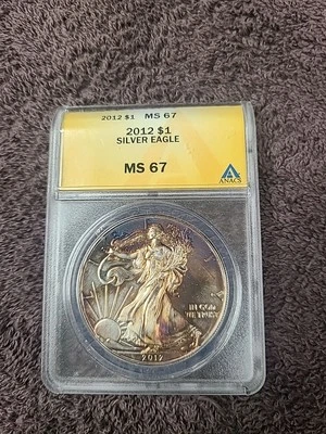 2012 Silver American Eagle Coin-🌈Rainbow Toning🌈 ANACS  - Image 1 of 4