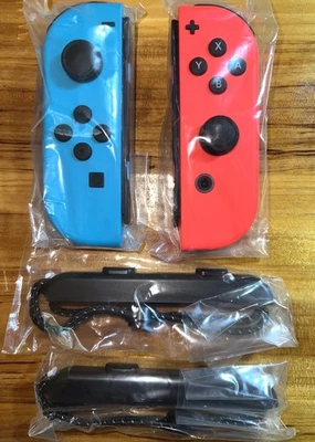 NEW Nintendo SWITCH Neon Blue and Red JOY-CON Controllers from OLED Set w/Straps - Image 1 of 4