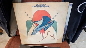 Eagles On The Border Asylum 7E-1004 Textured Jacket EX/VG w/poster - Picture 1 of 6