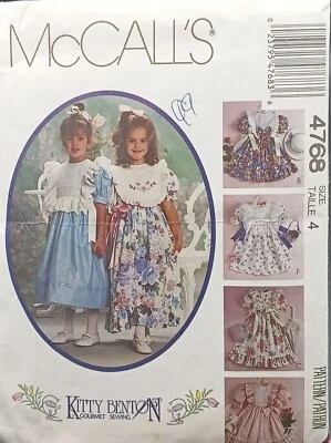 UNCUT McCalls 4768 Childrens & Girls Dress And Detachable Aprons Sewing Pattern - Image 1 of 2