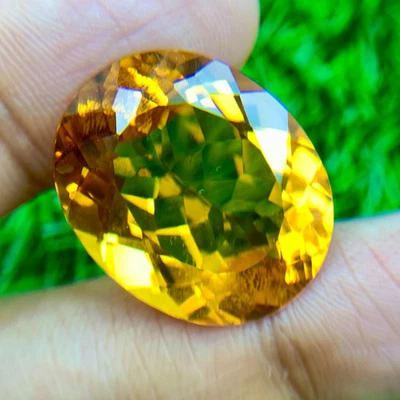 MESMERIZE 23.18 CT GOLDEN YELLOW CITRINE OVAL LAB CREATED LOOSE GEMSTONE - Image 1 of 3