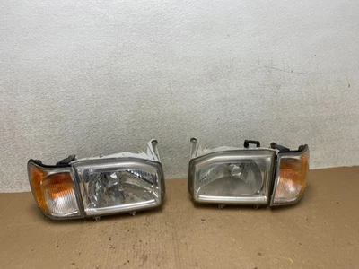 Juego de faros halógenos laterales izquierdo+derecho Nissan Pathfinder 1999-2004 OEM U0367 DW Foto 1 de 4