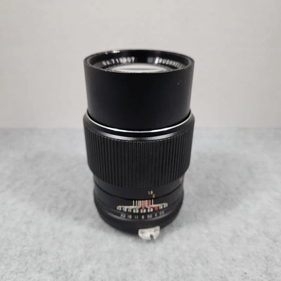 Cámara con lente automática Bushnell 135 mm f2,8 Foto 1 de 4