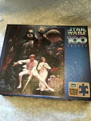 puzzle Star Wars 100 piezas. RoseArt. Respaldo de corcho.  11 x 12,5 pulgadas.   Foto 1 de 4