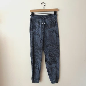 Jogger de calentamiento para niña Athleta azul negro remolino juvenil talla XL/14 - Imagen 1 de 9