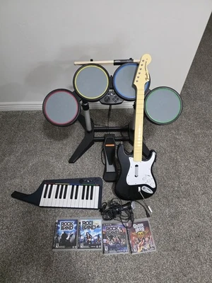 Playstation Rock Band 1, 2 & 3 Drums, 1Guitar, 1Keyboard, 1Mic, Bundle PS3PS4PS5 - Image 1 of 4