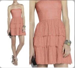 $368 NUEVO CON ETIQUETAS VESTIDO BCBG MAXAZRIA LILAH ENCAJE SIN TIRANTES VOLANTES CORAL TALLA 2 - Imagen 1 de 7